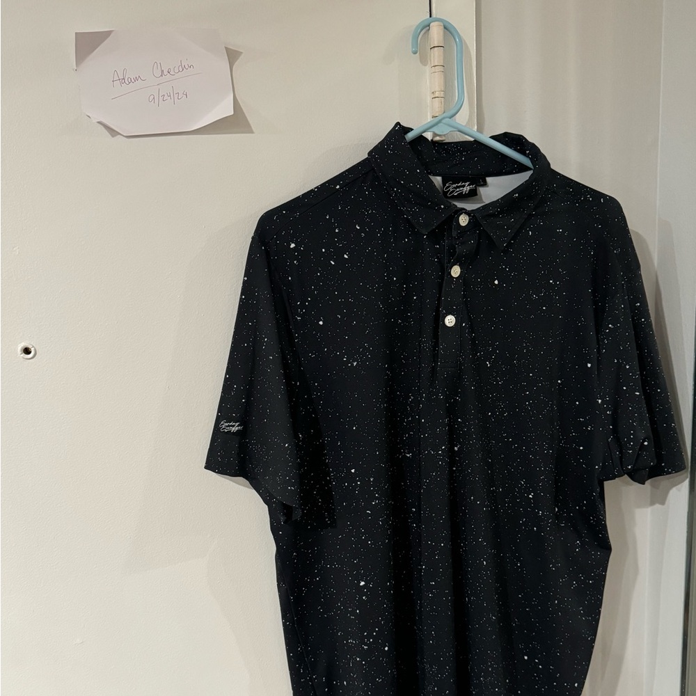 Sunday swagger black with white speckles golf polo